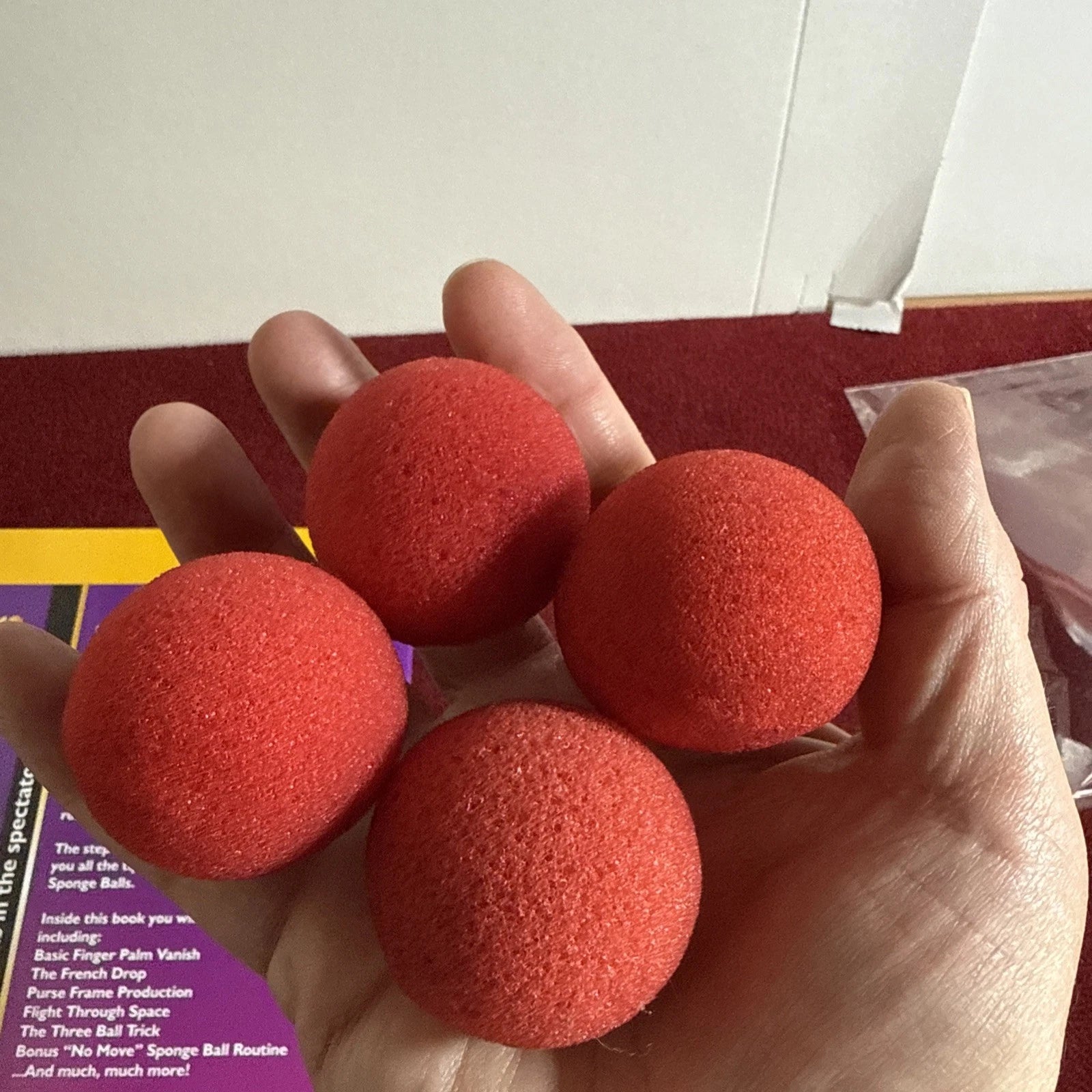 4 RED 1.5” SPONGE BALLS + 25 TRICKS & TIPS BOOKLET