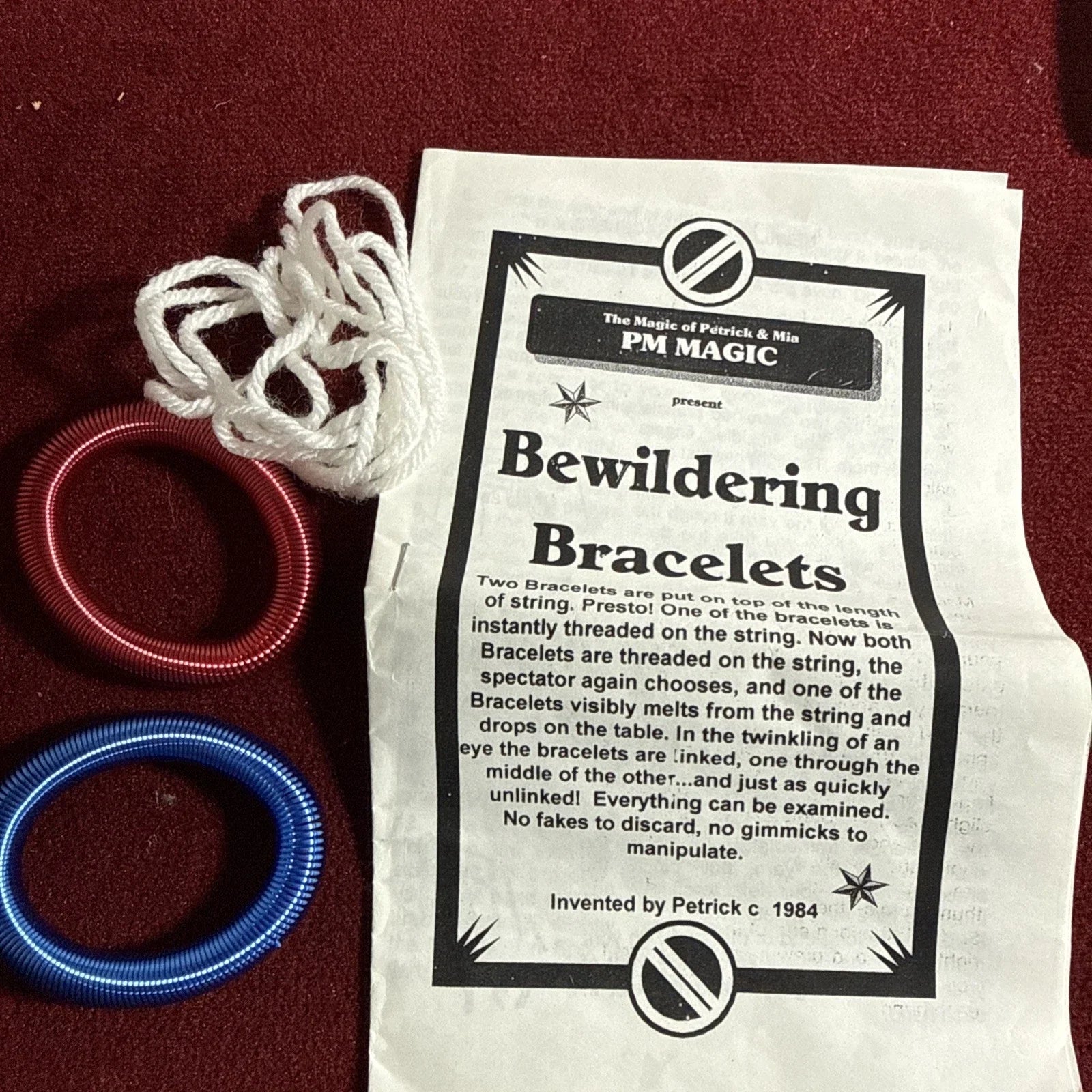 Petrick & Mia Bewildering Bracelets - Close-up Magic Trick- Bracket Thru Yarn